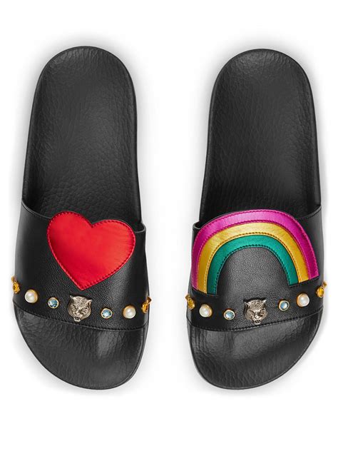 gucci pursuit heart & rainbow patch leather slides|Gucci heart bracelet with trademark.